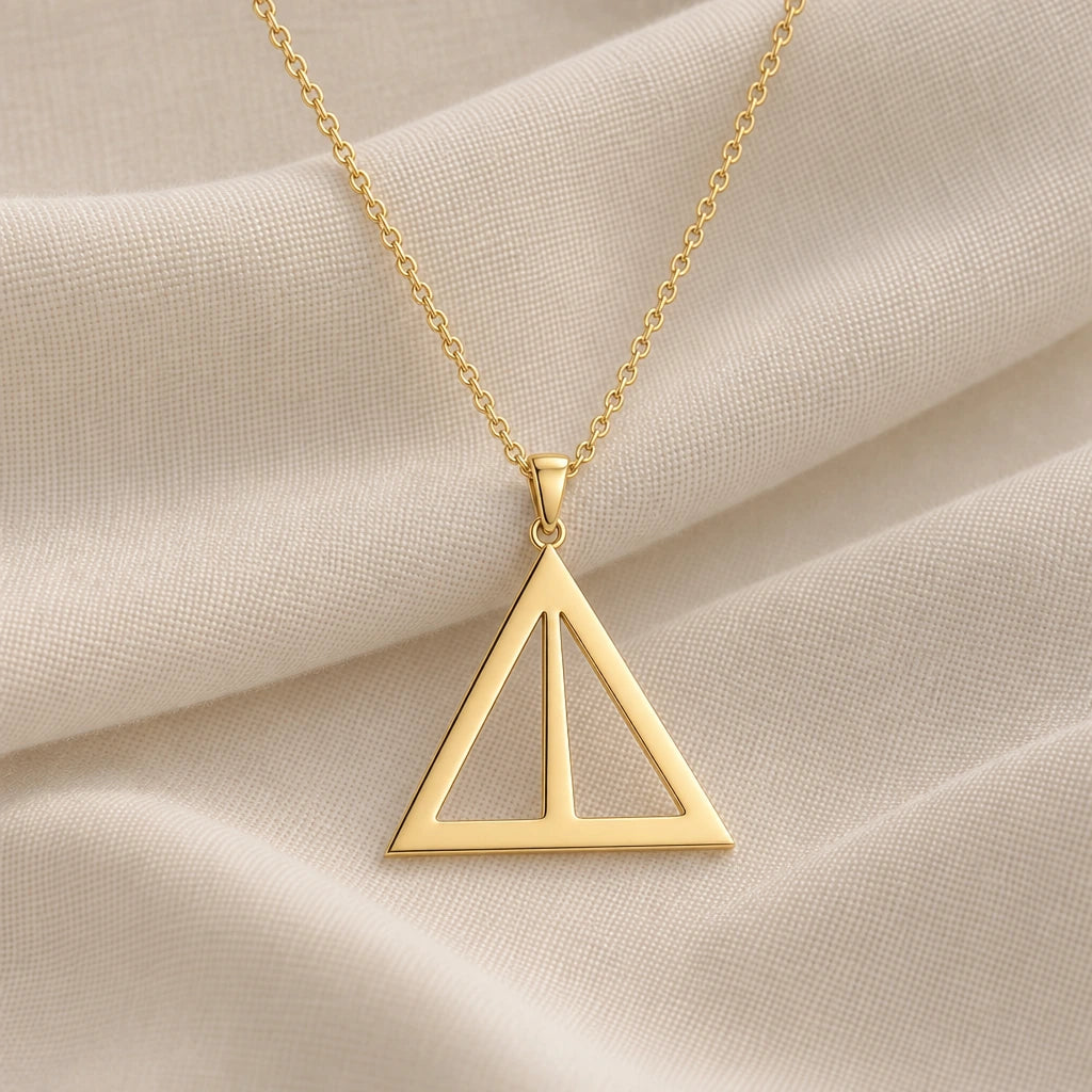Asia Asteroid Symbol pendant necklace in an 18k gold plated finish