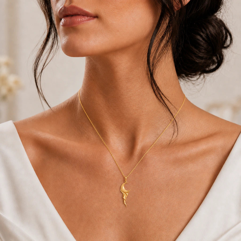 Lunar silk crescent moon pendant necklace worn, close-up