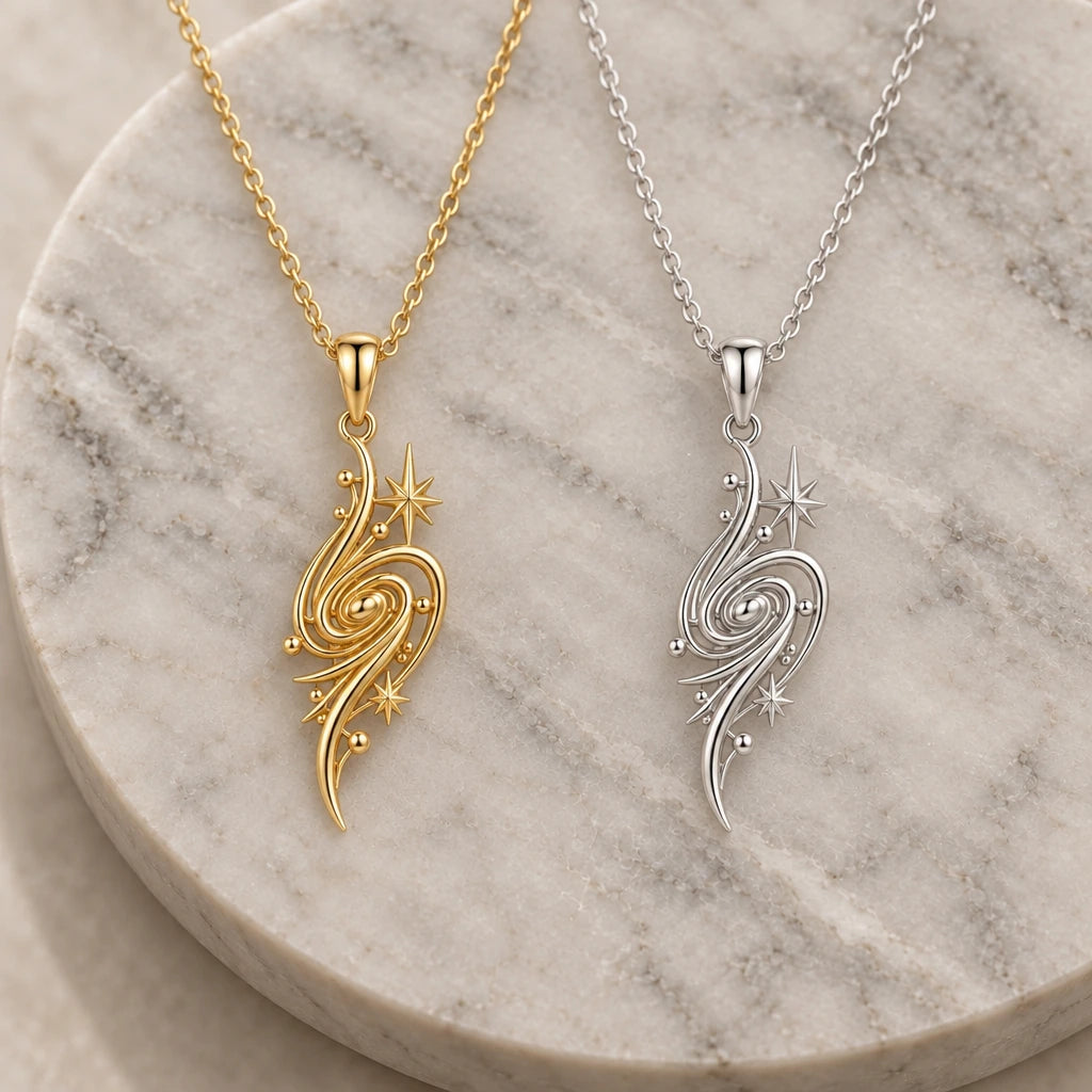 Golden Nebula pendant necklace in silver and gold finishes side by side