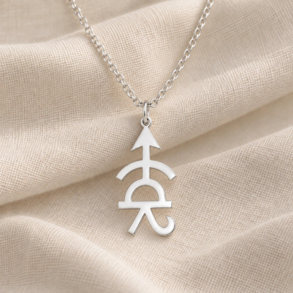 925 sterling silver achilles asteroid symbol pendant necklace on cream fabric