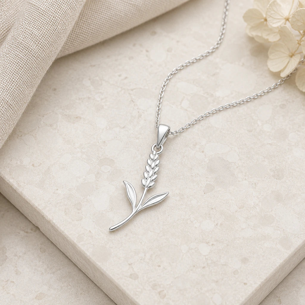 Close-up of silver lavender flower pendant showing the sculpted detail