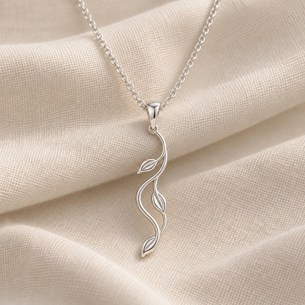 925 sterling silver aurora vine pendant necklace on cream fabric