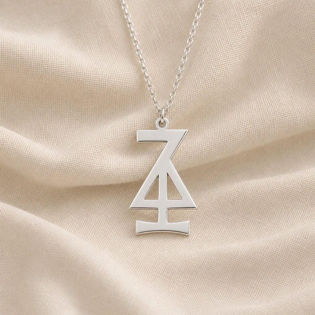 925 sterling silver hansa asteroid symbol pendant necklace on cream fabric