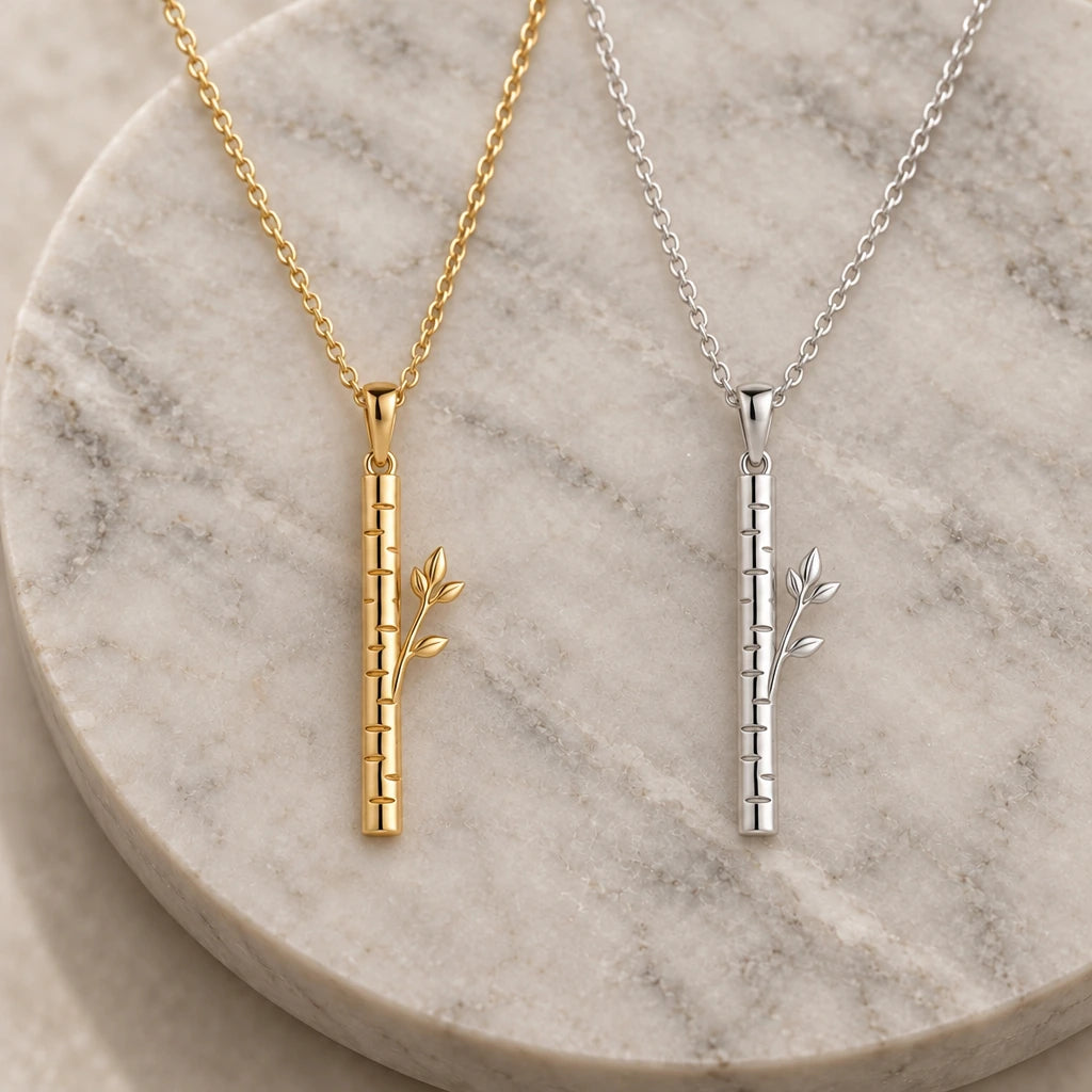 Birch Veil pendant necklace in silver and gold finishes side by side