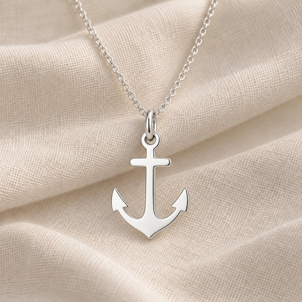 925 sterling silver anchor pendant necklace on cream fabric