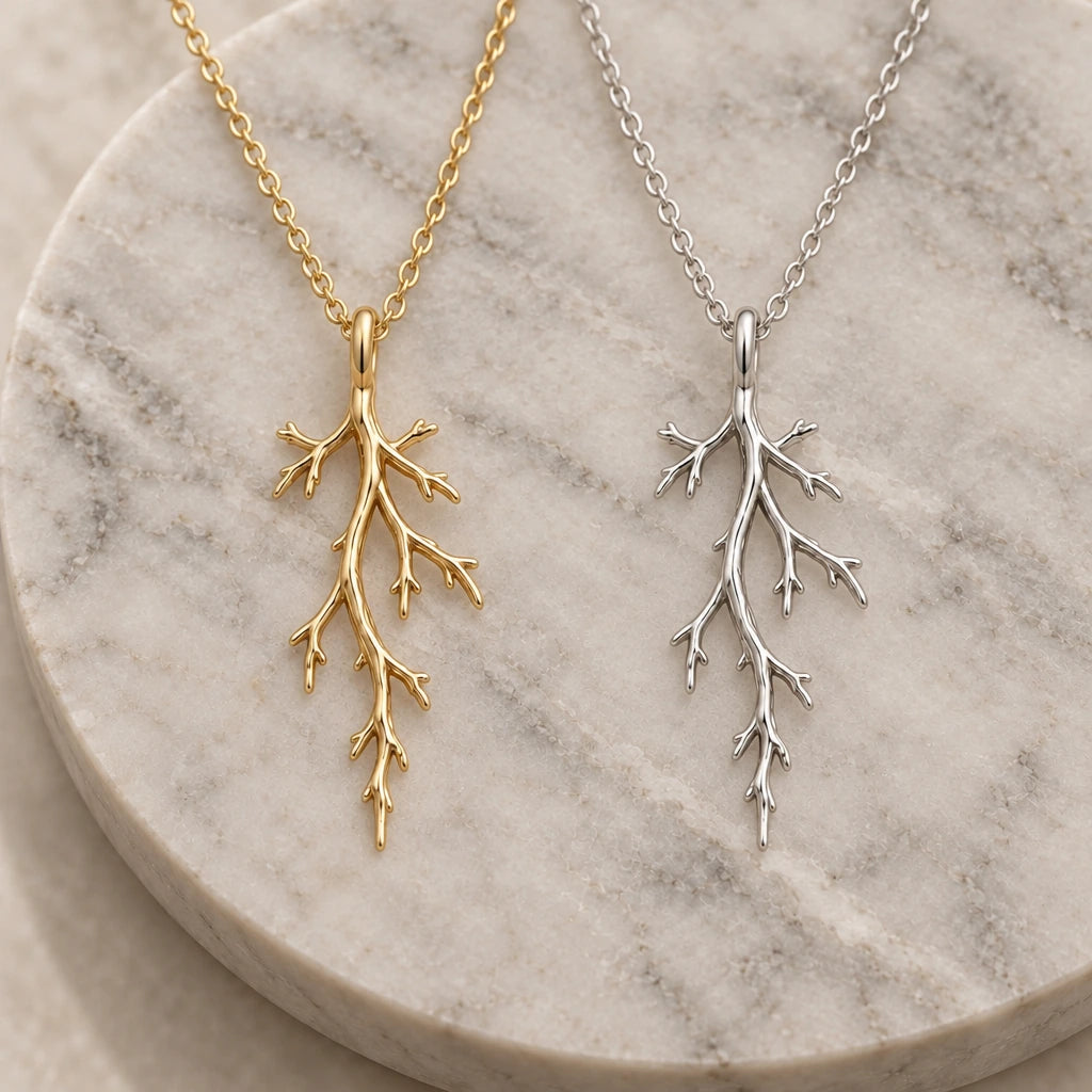 Mystic Forest Branch pendant necklace in silver and gold finishes side by side