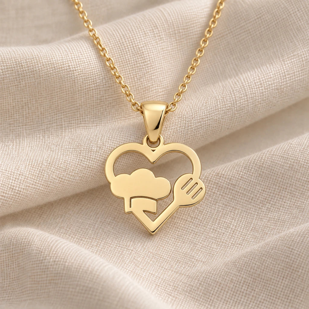 Chef Heart pendant necklace in an 18k gold plated finish