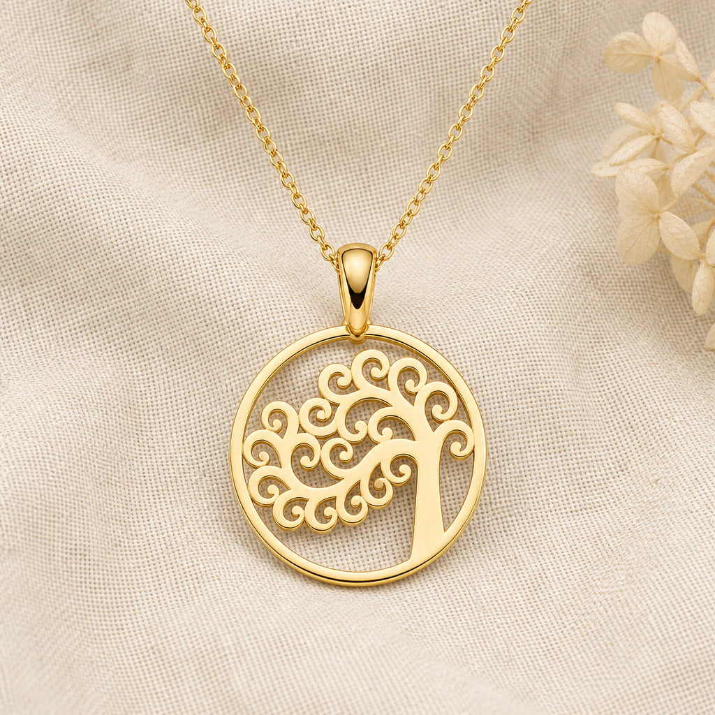 Tree of Life Circle pendant necklace in a warm gold finish on cream fabric