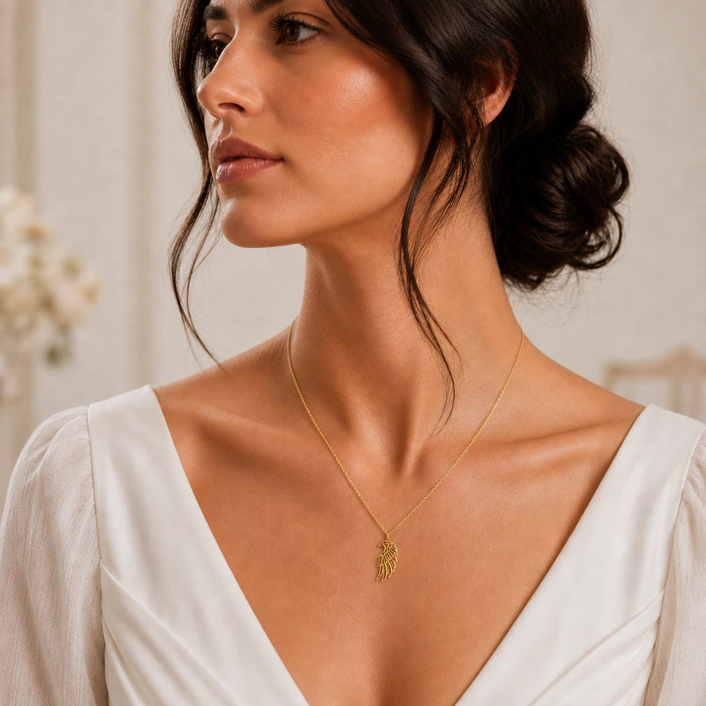 Ancient falcon wing pendant necklace worn by a model
