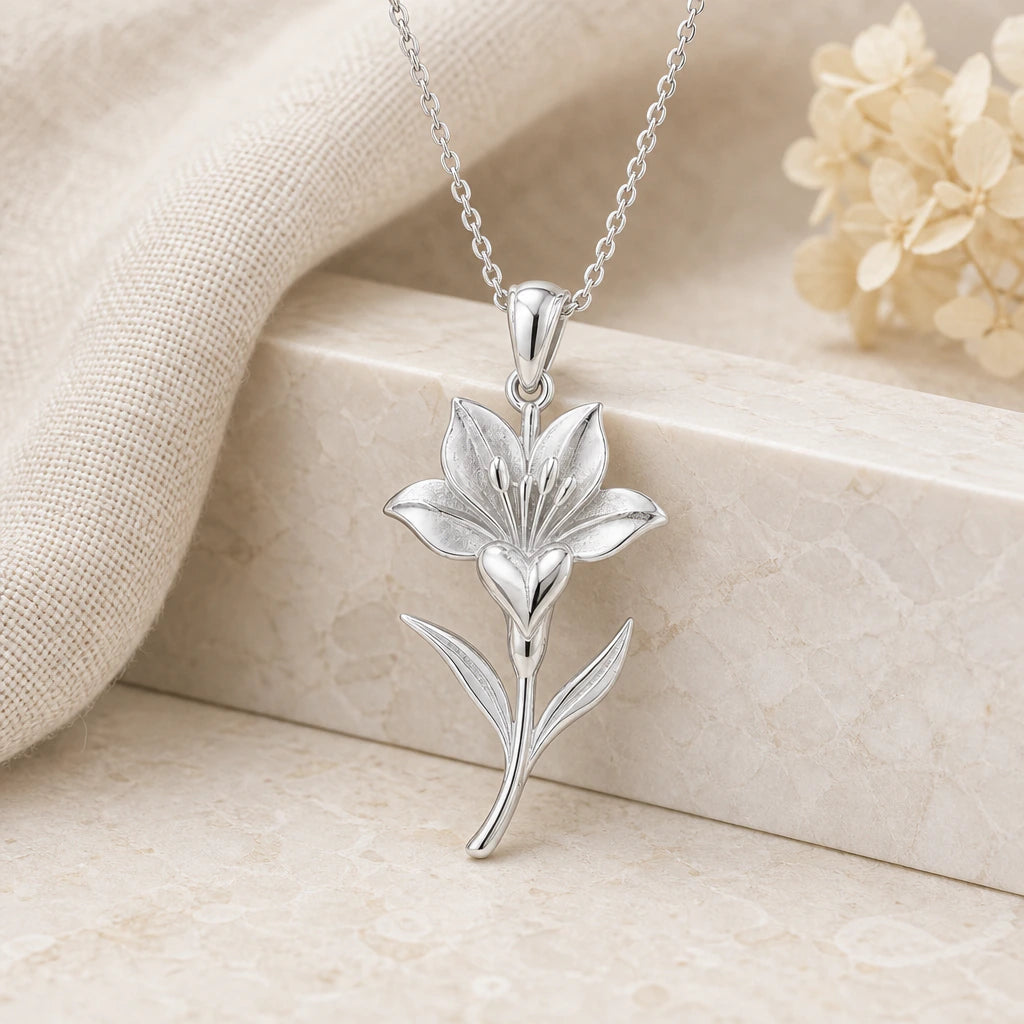 925 sterling silver saffron crocus flower pendant necklace on softly folded cream linen