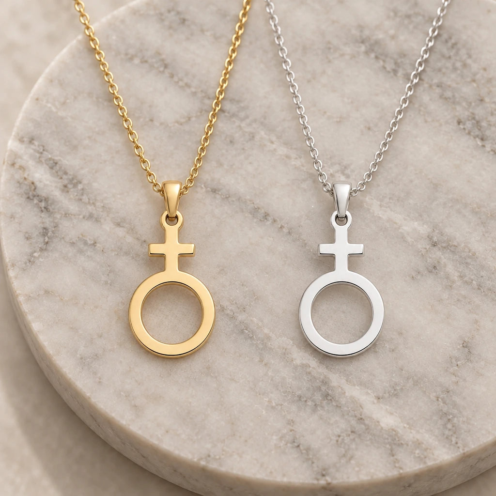 Antimony Alchemy Symbol pendant necklace in silver and gold finishes side by side