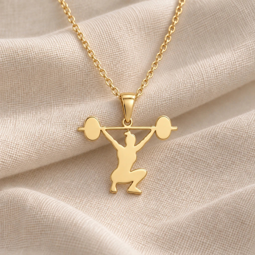 Weightlifter Snatch pendant necklace in an 18k gold plated finish