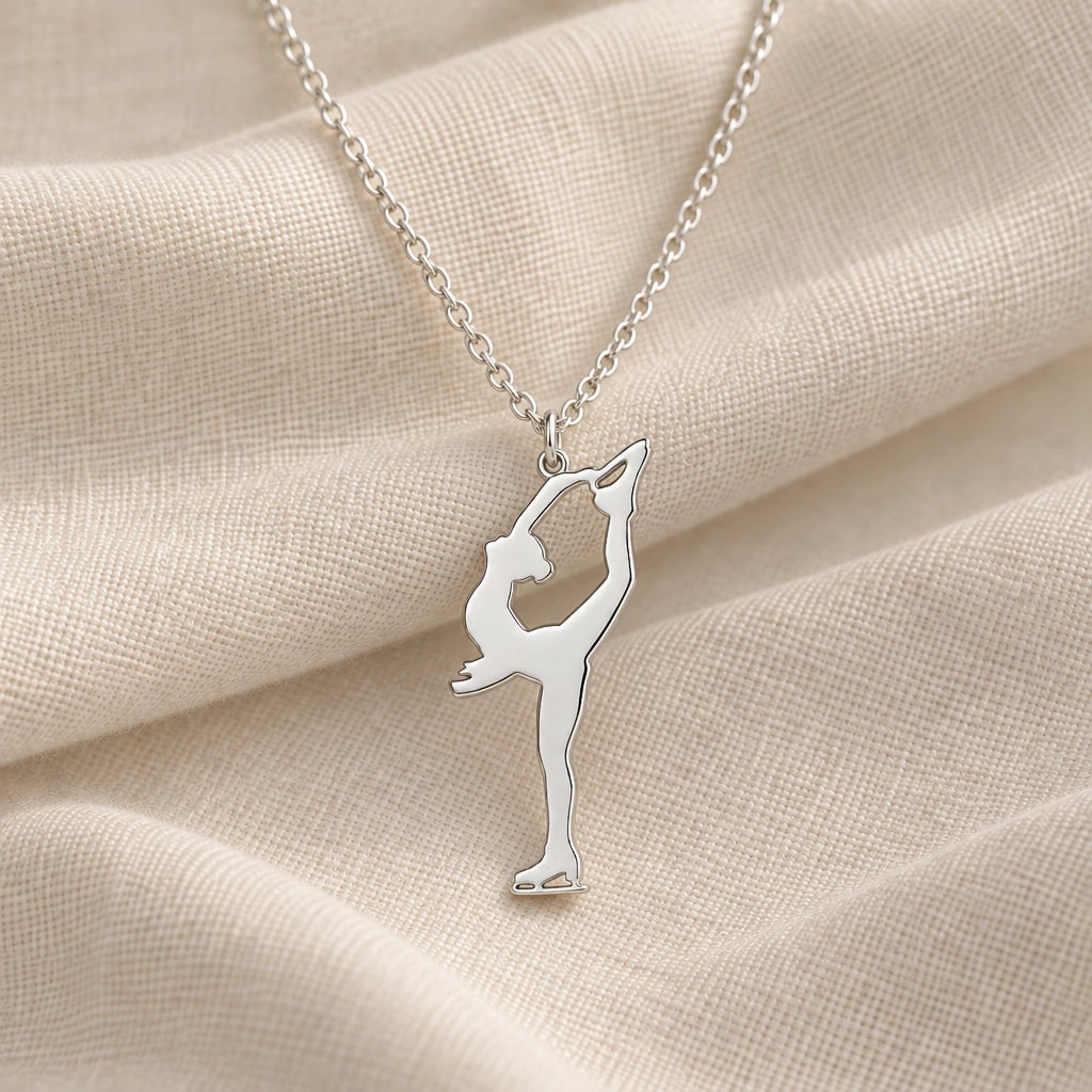 925 sterling silver figure skater biellmann pendant necklace on cream fabric