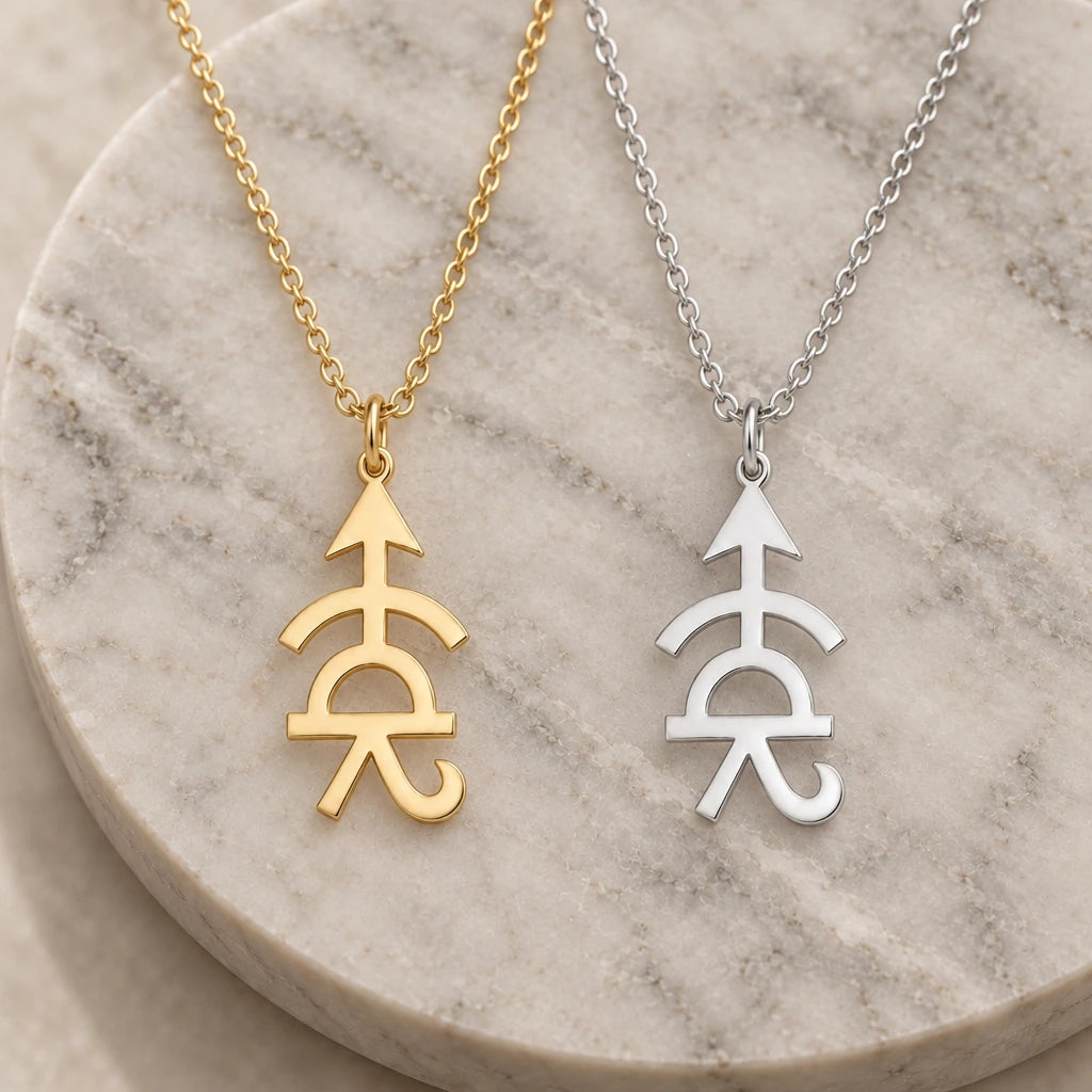 Achilles Asteroid Symbol pendant necklace in silver and gold finishes side by side