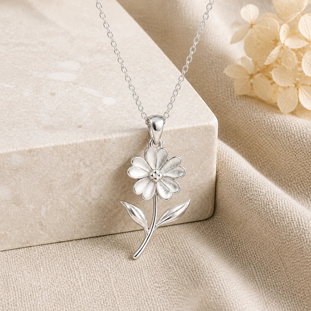 925 sterling silver verbena flower pendant necklace on softly folded cream linen