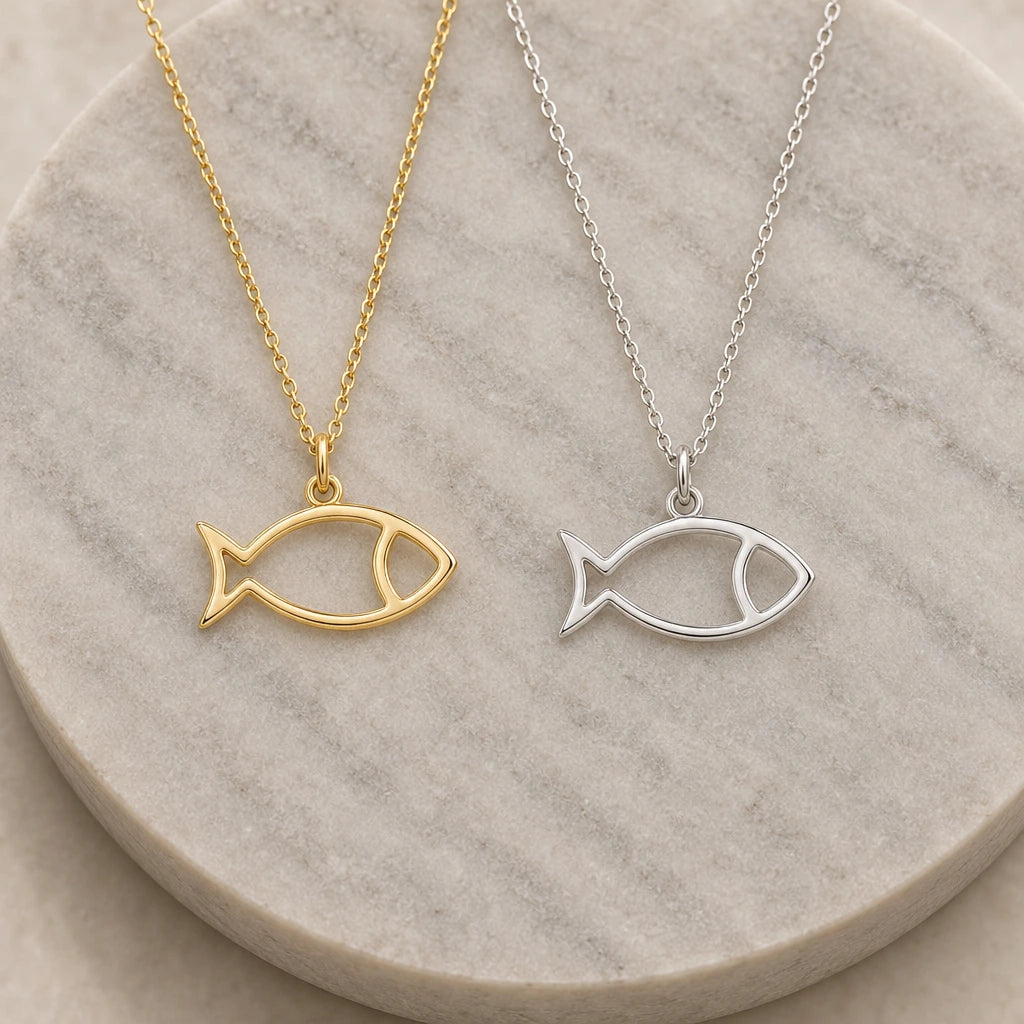 Fish Outline pendant necklace in silver and gold finishes side by side