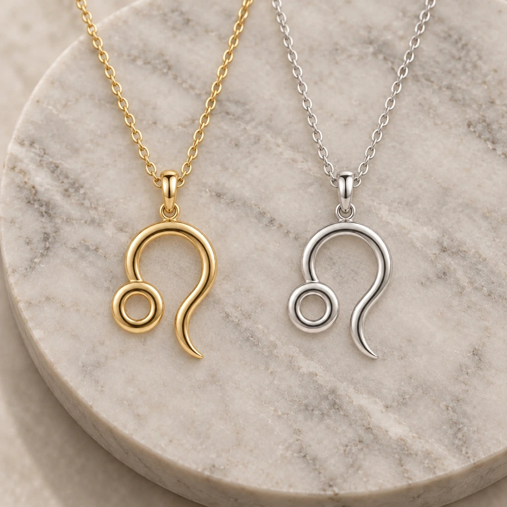 Leo Zodiac Glyph pendant necklace in silver and gold finishes side by side