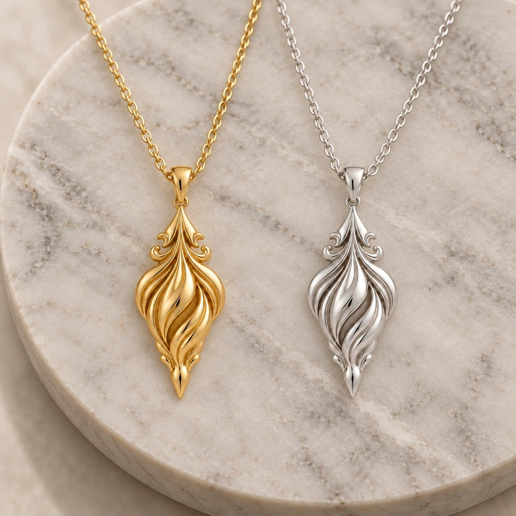 Sacred Aurora Drop pendant necklace in silver and gold finishes side by side