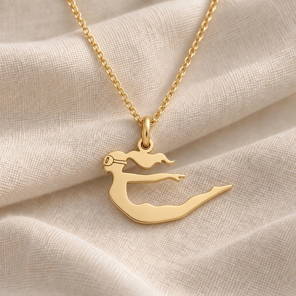 Diver Woman pendant necklace in an 18k gold plated finish
