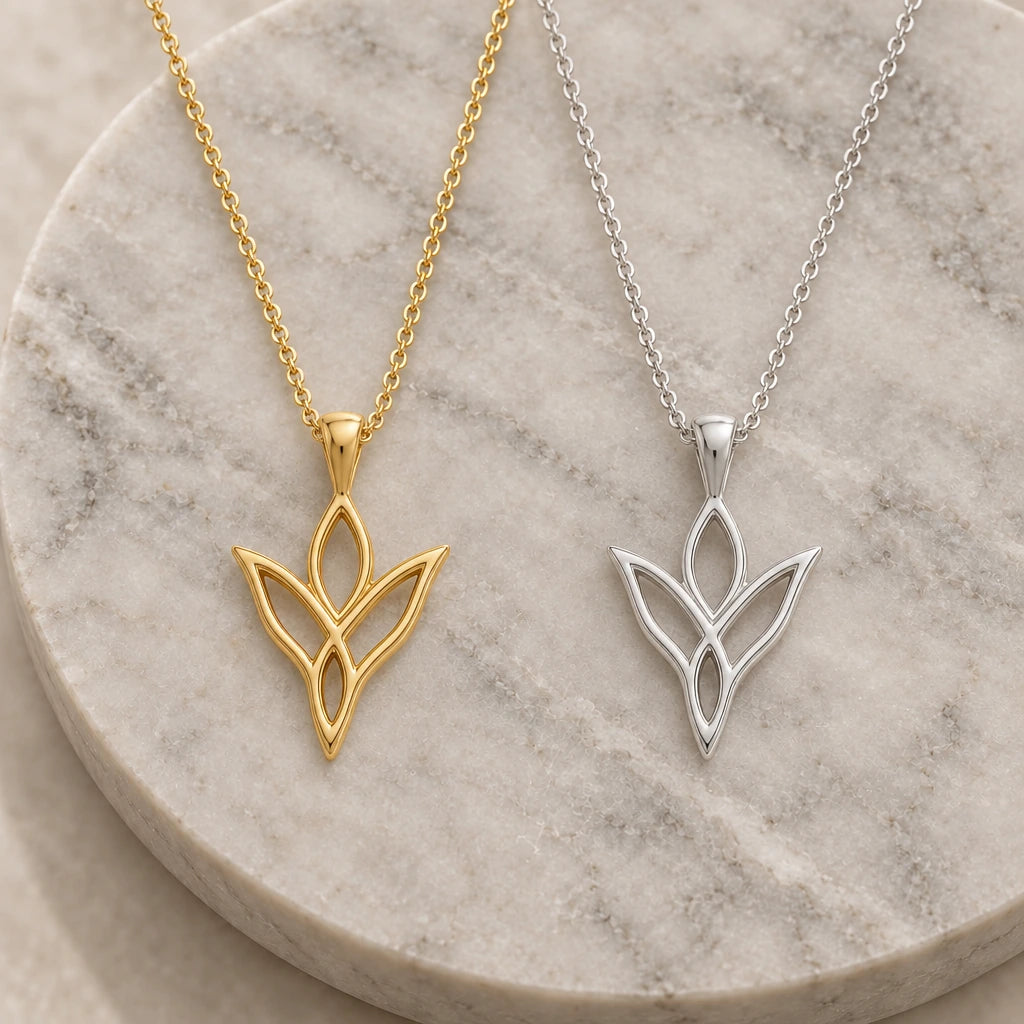 Elven Knot Leaf pendant necklace in silver and gold finishes side by side