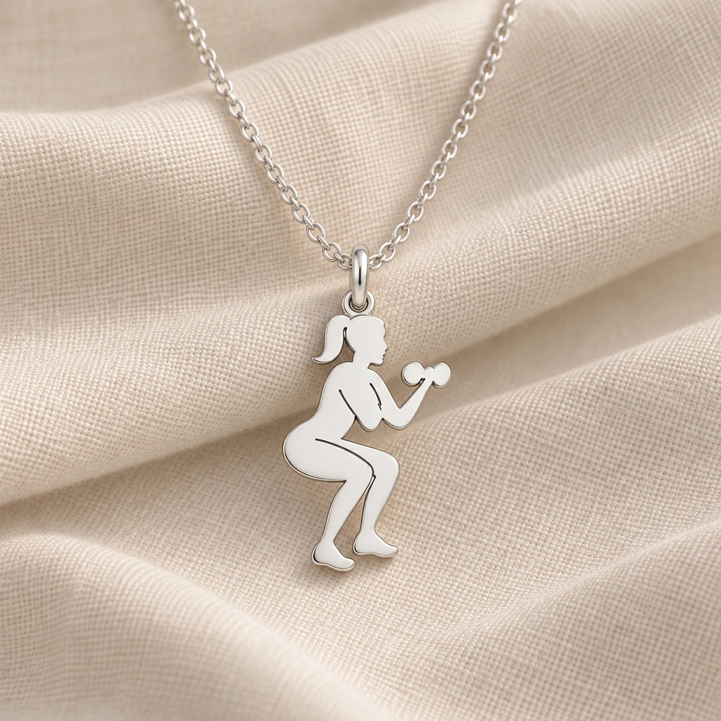 925 sterling silver fitness squat woman pendant necklace on cream fabric