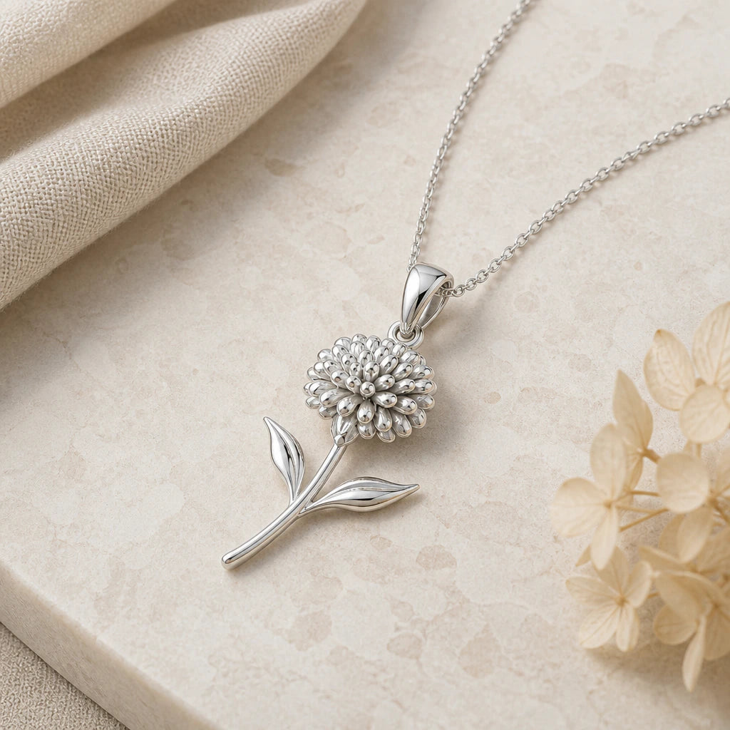 Close-up of silver sedum flower pendant showing the sculpted detail