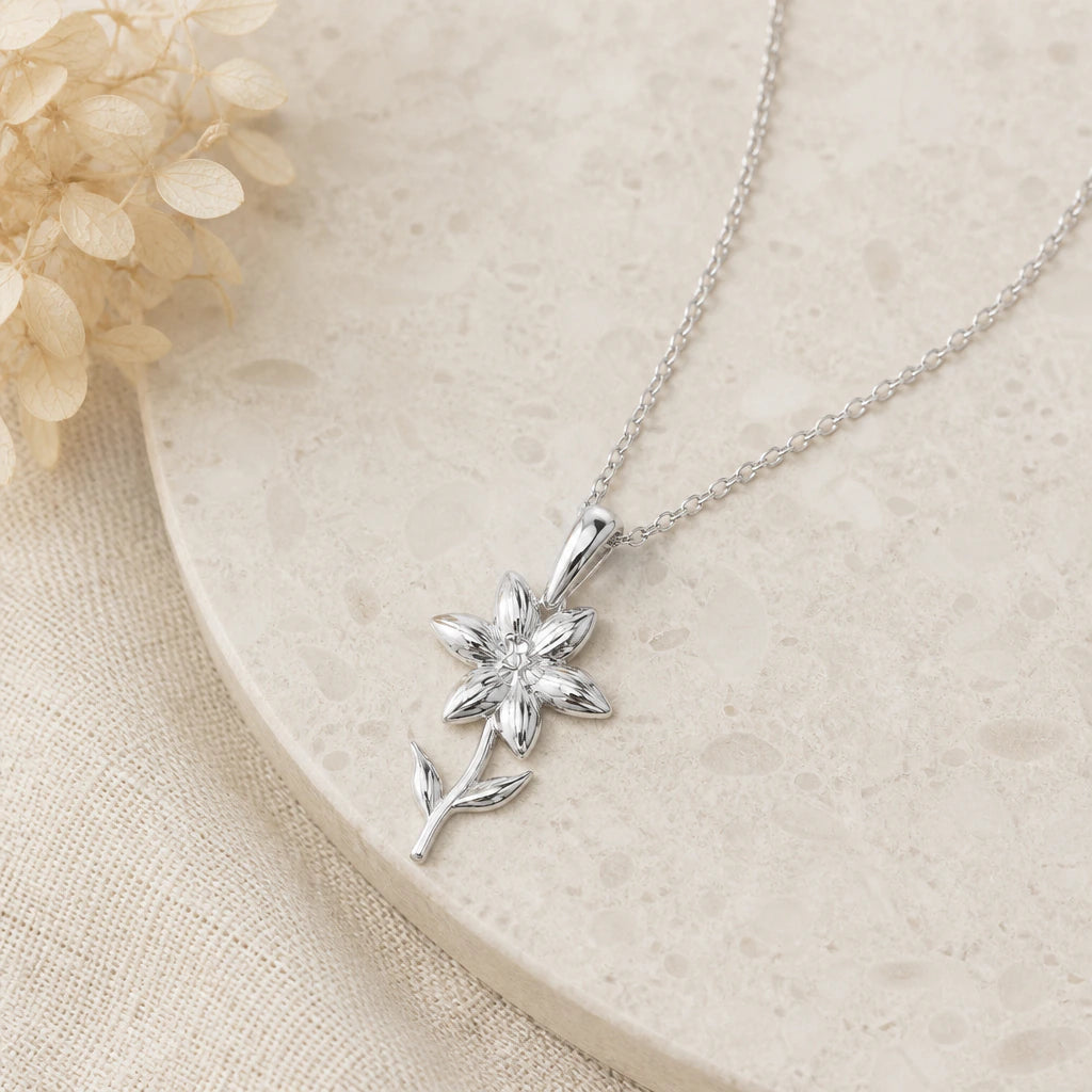 Close-up of silver single lily flower pendant showing the sculpted detail