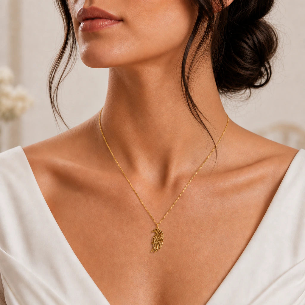 Ancient falcon wing pendant necklace worn, close-up