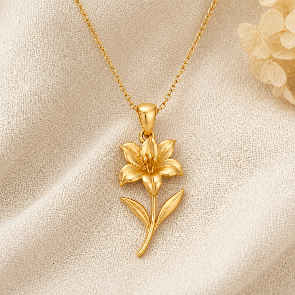 Amaryllis Bloom Flower pendant necklace in a warm gold finish on cream fabric
