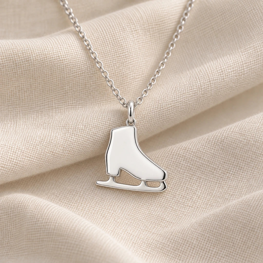 925 sterling silver ice skate pendant necklace on cream fabric