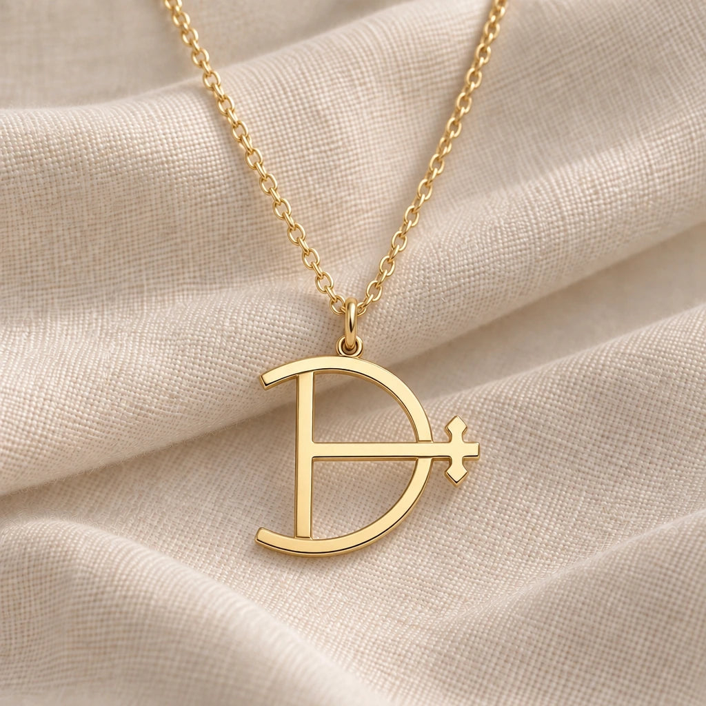 Magnesium Alchemy Symbol pendant necklace in an 18k gold plated finish