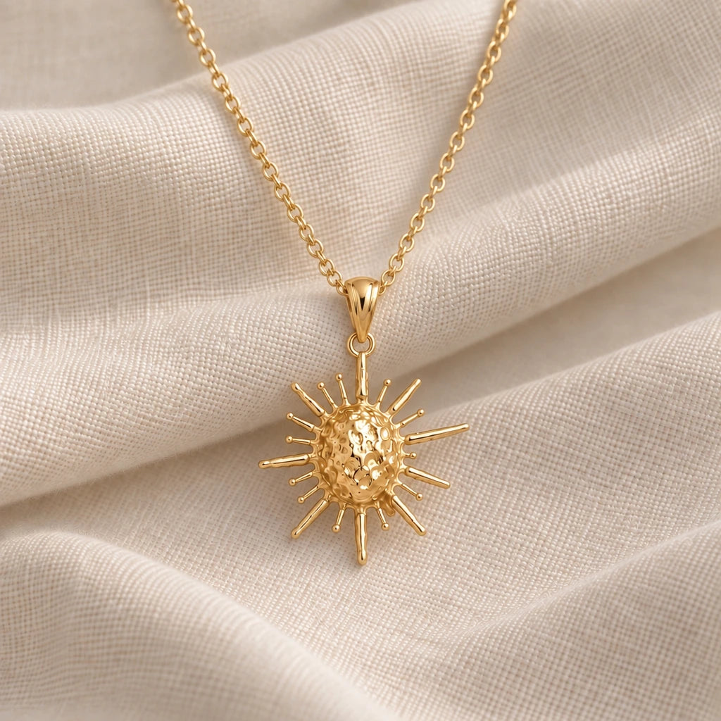 Solar Fragment Spiked Sun pendant necklace in an 18k gold plated finish