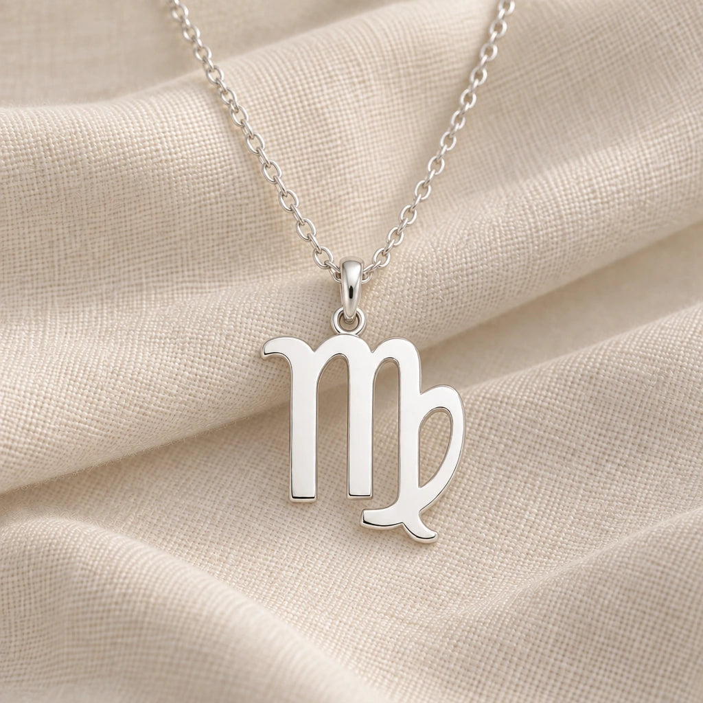 925 sterling silver virgo zodiac glyph pendant necklace on cream fabric
