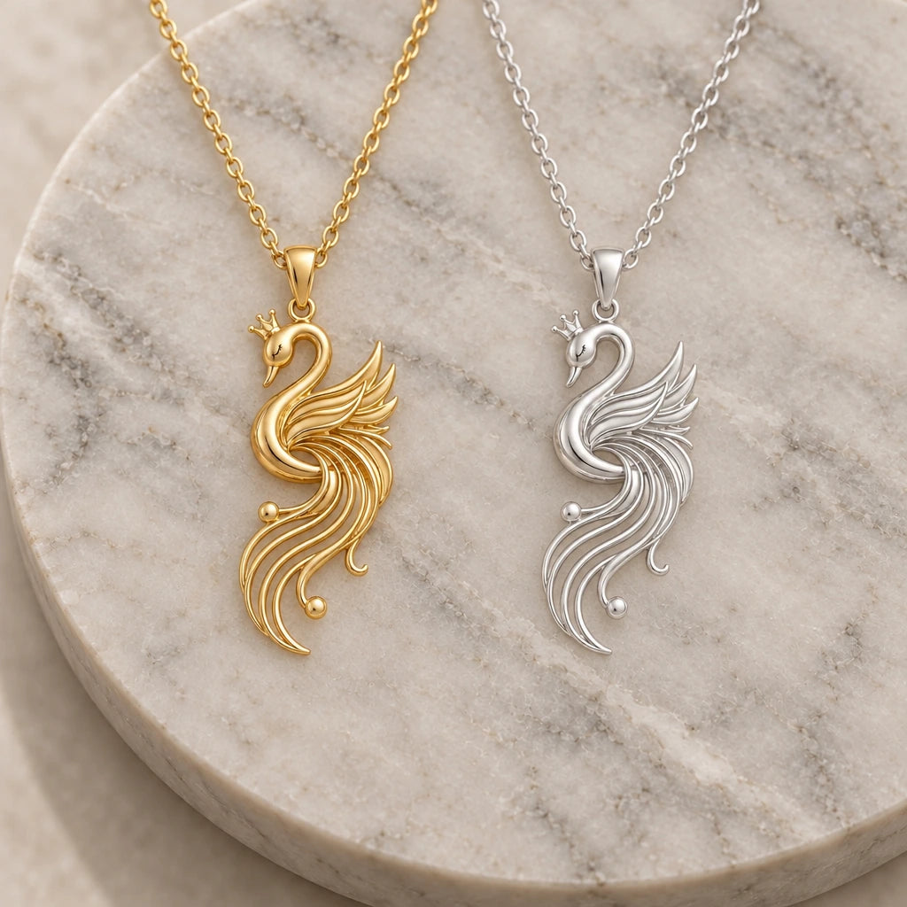 Aurora Swan pendant necklace in silver and gold finishes side by side