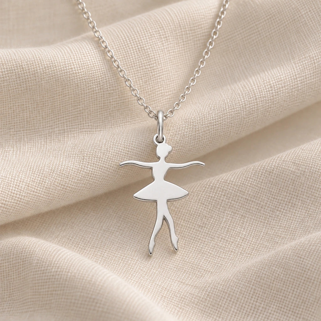925 sterling silver ballerina tutu pendant necklace on cream fabric