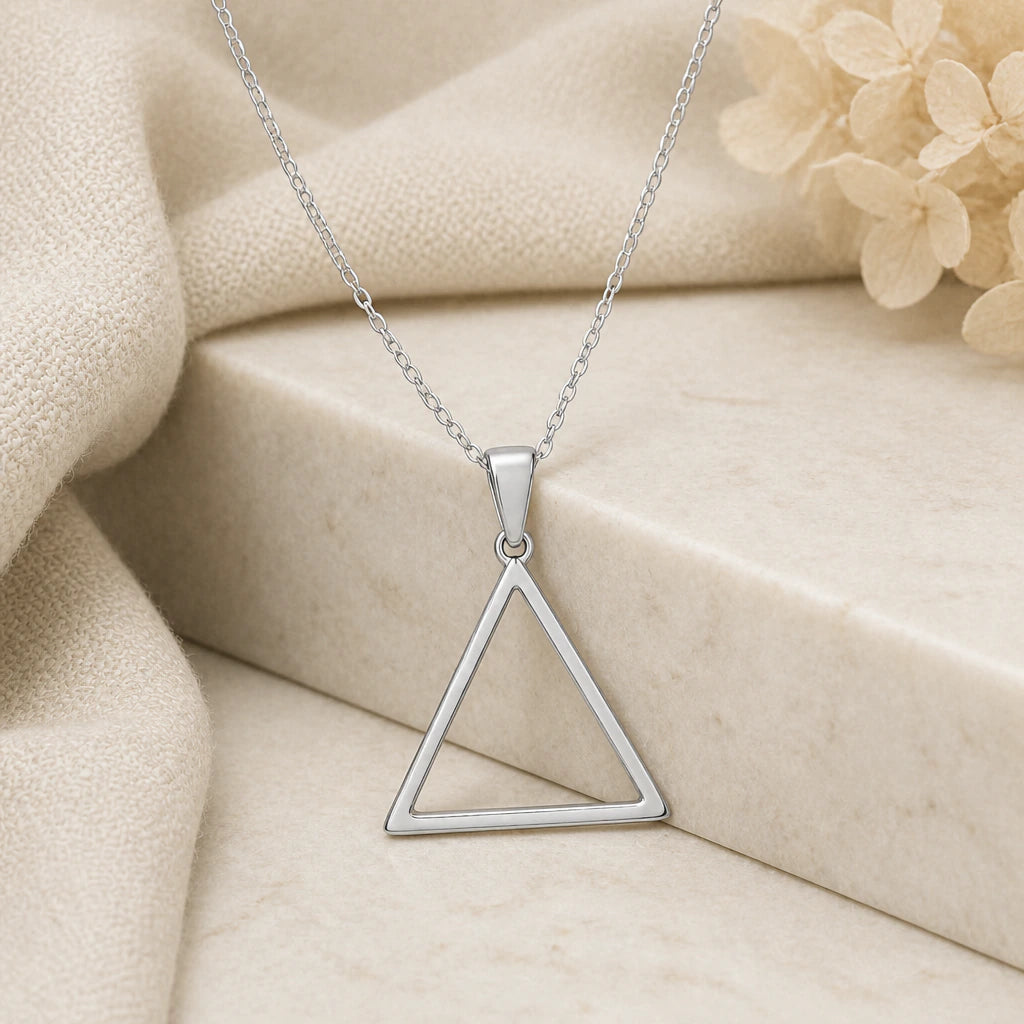 925 sterling silver water element triangle pendant necklace on softly folded cream linen