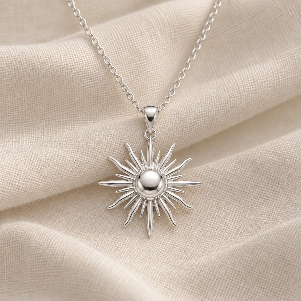 925 sterling silver radiant sun ray pendant necklace on cream fabric