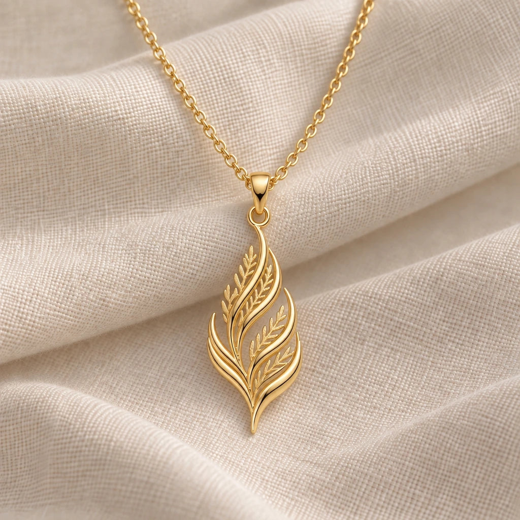 Cedar Flame Fronds pendant necklace in an 18k gold plated finish