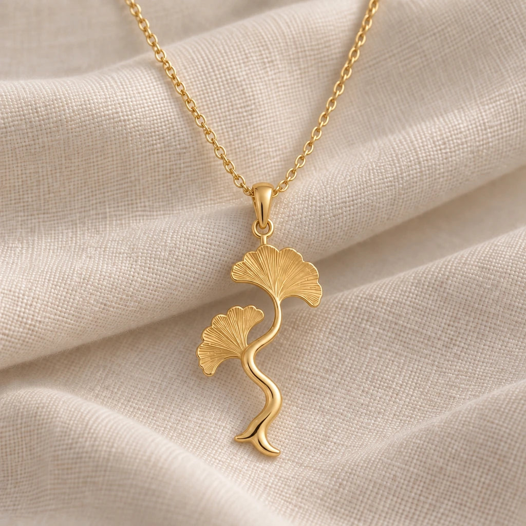 Ginkgo Wave Stem pendant necklace in an 18k gold plated finish