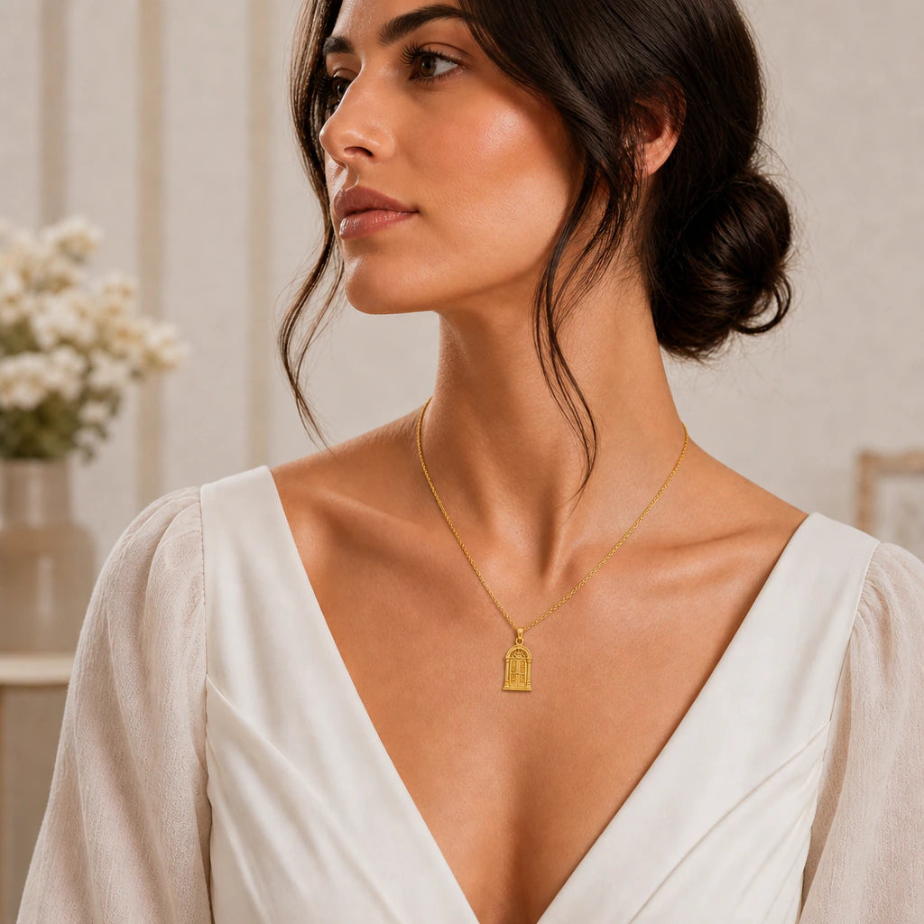 Vintage doorway pendant necklace worn by a model