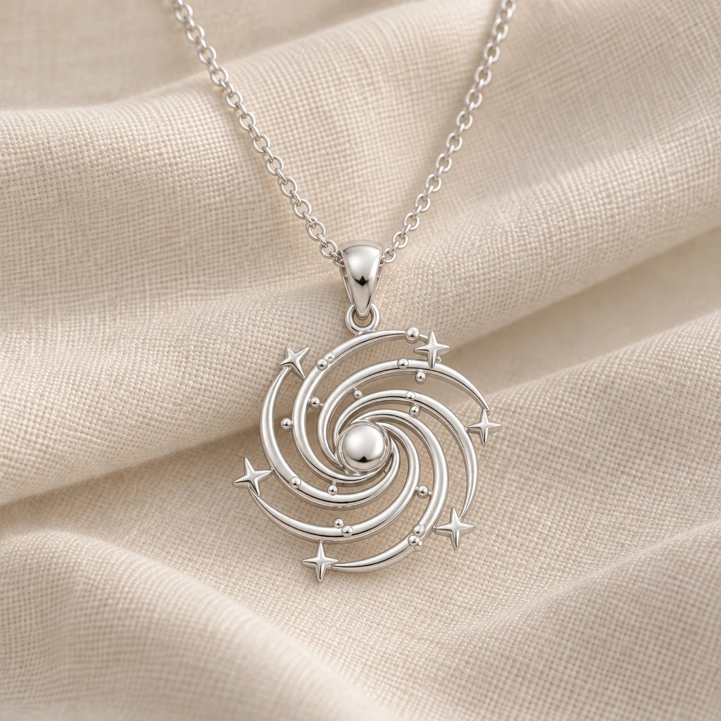 925 sterling silver spiral galaxy pendant necklace on cream fabric