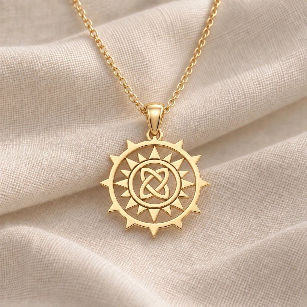 Triquetra Sun Knot pendant necklace in an 18k gold plated finish