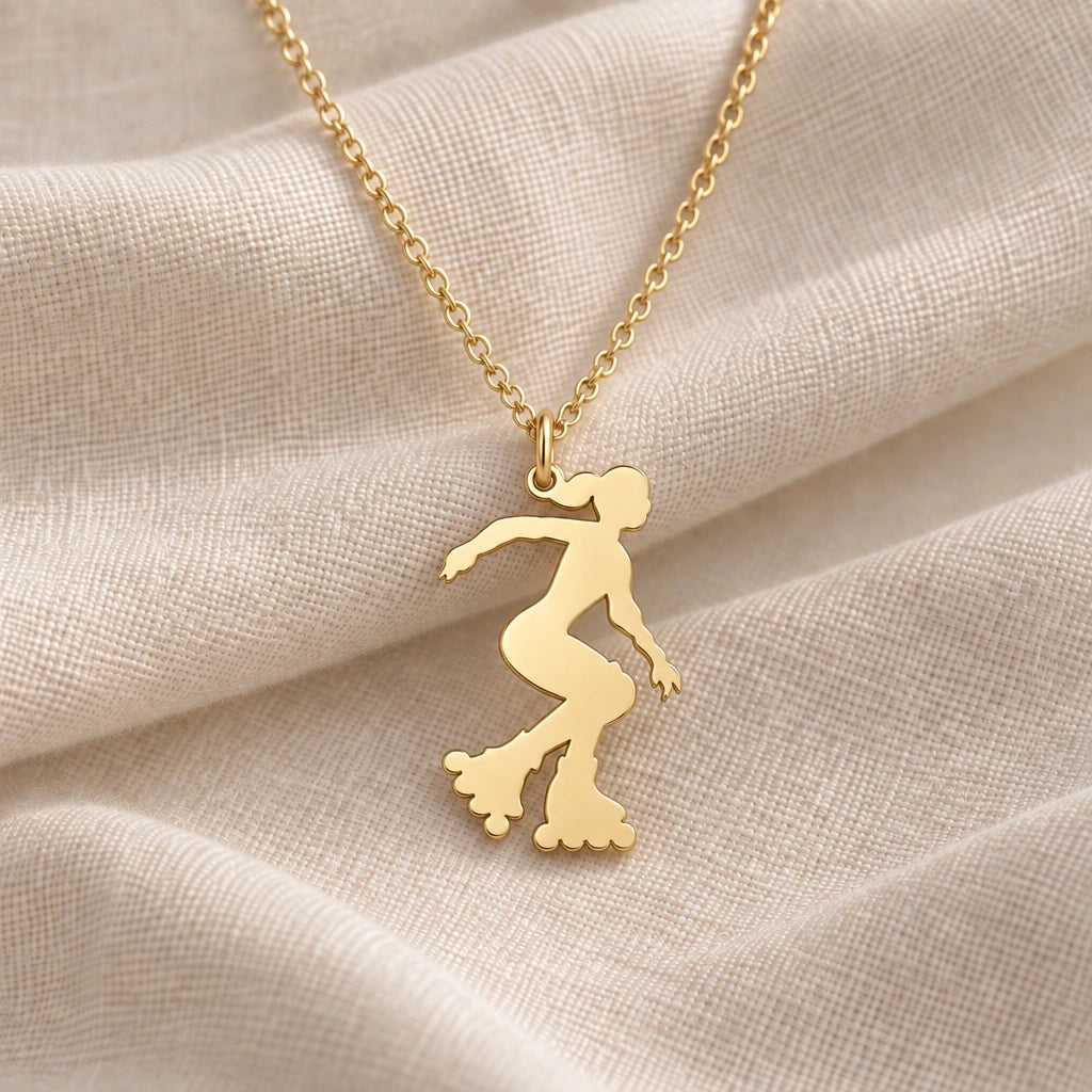 Roller Skater pendant necklace in an 18k gold plated finish