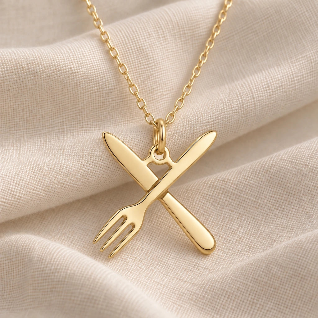 Chef Fork and Knife pendant necklace in an 18k gold plated finish