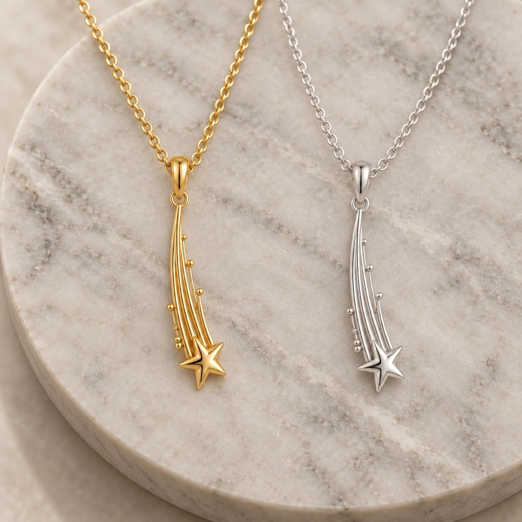 Falling Star Trail pendant necklace in silver and gold finishes side by side