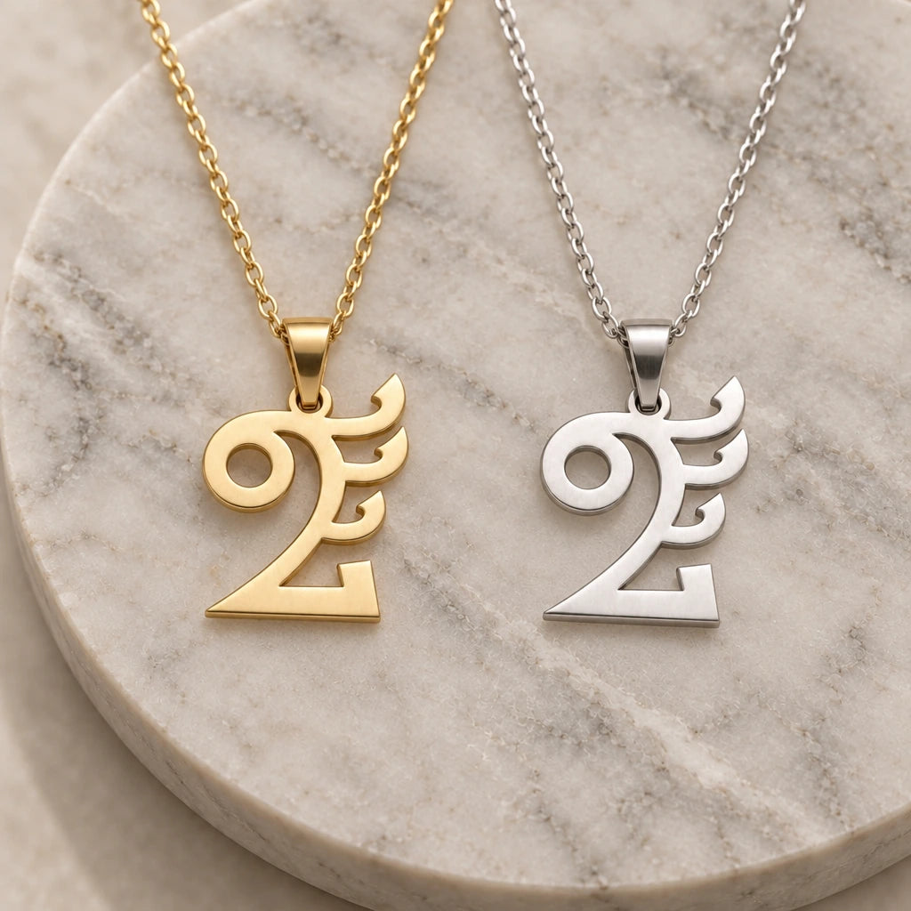 Quetzalcoatl Symbol pendant necklace in silver and gold finishes side by side