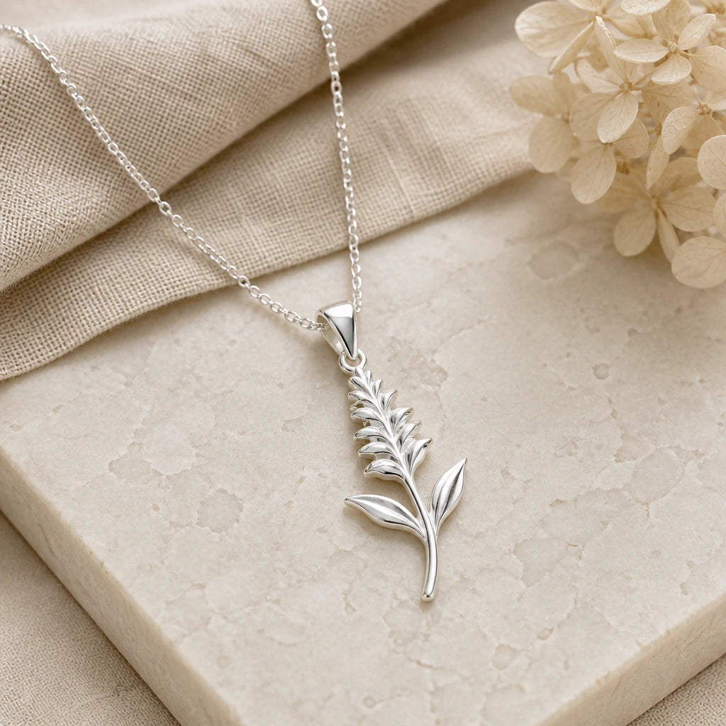 Close-up of silver salvia flower pendant showing the sculpted detail