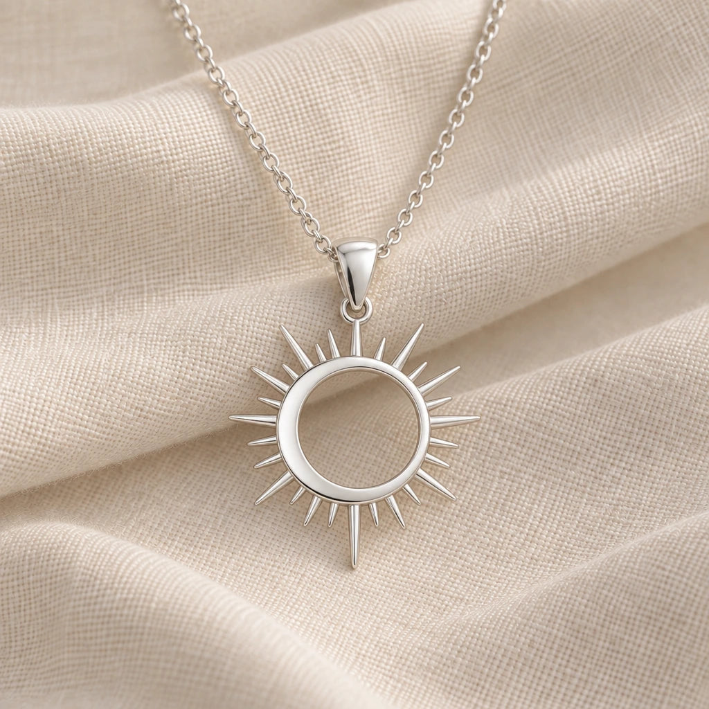 925 sterling silver solar eclipse ring pendant necklace on cream fabric