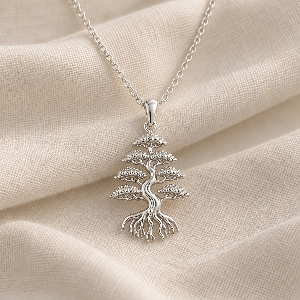 925 sterling silver cedar crown bonsai pendant necklace on cream fabric