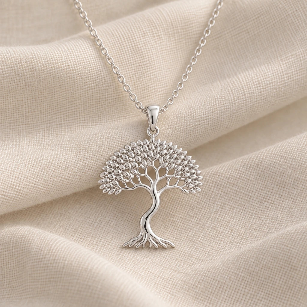 925 sterling silver elm whisper tree of life pendant necklace on cream fabric
